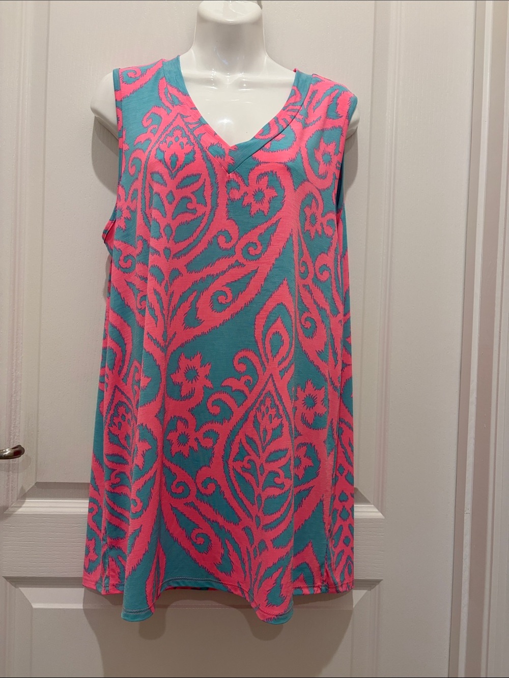 HEIMISH USA Sleeveless V-Neck Teal and Pink Printed Tunic